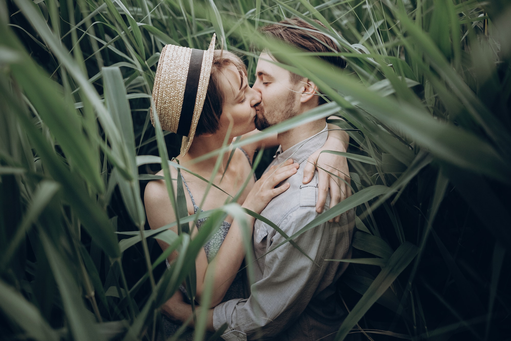 happy-hipster-couple-embracing-at-lake-in-cane.jpg